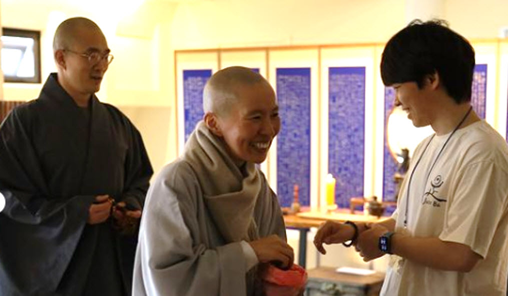 Head Monks gifting prayer beads