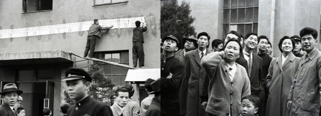 A glimpse of the crowd gathered in front of the list of students accepted to the College of Fine Arts in March 1956. The handwritten admission list was posted in a long horizontal line on the exterior of a university building.